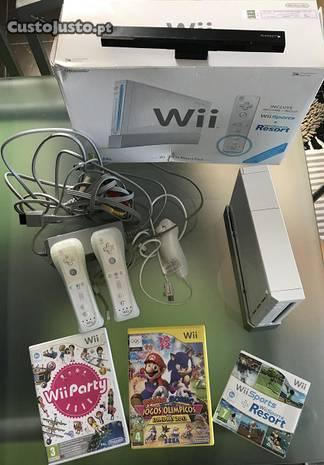 Wii com comandos e jogos