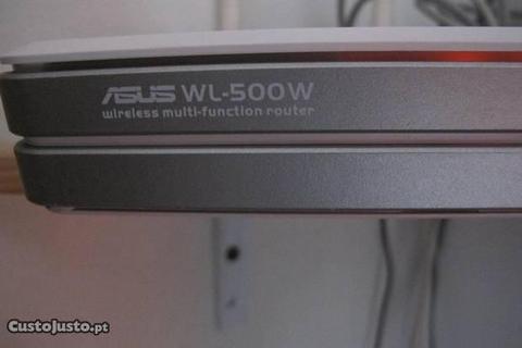Router Asus WL-500: 2 portas USB p/ Câmara e Disco