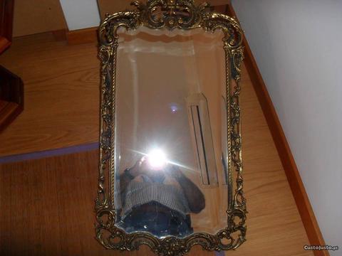 espelho biselado com cercadura em latão