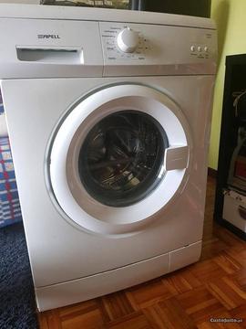 Máquina lavar roupa com barolho no tambor